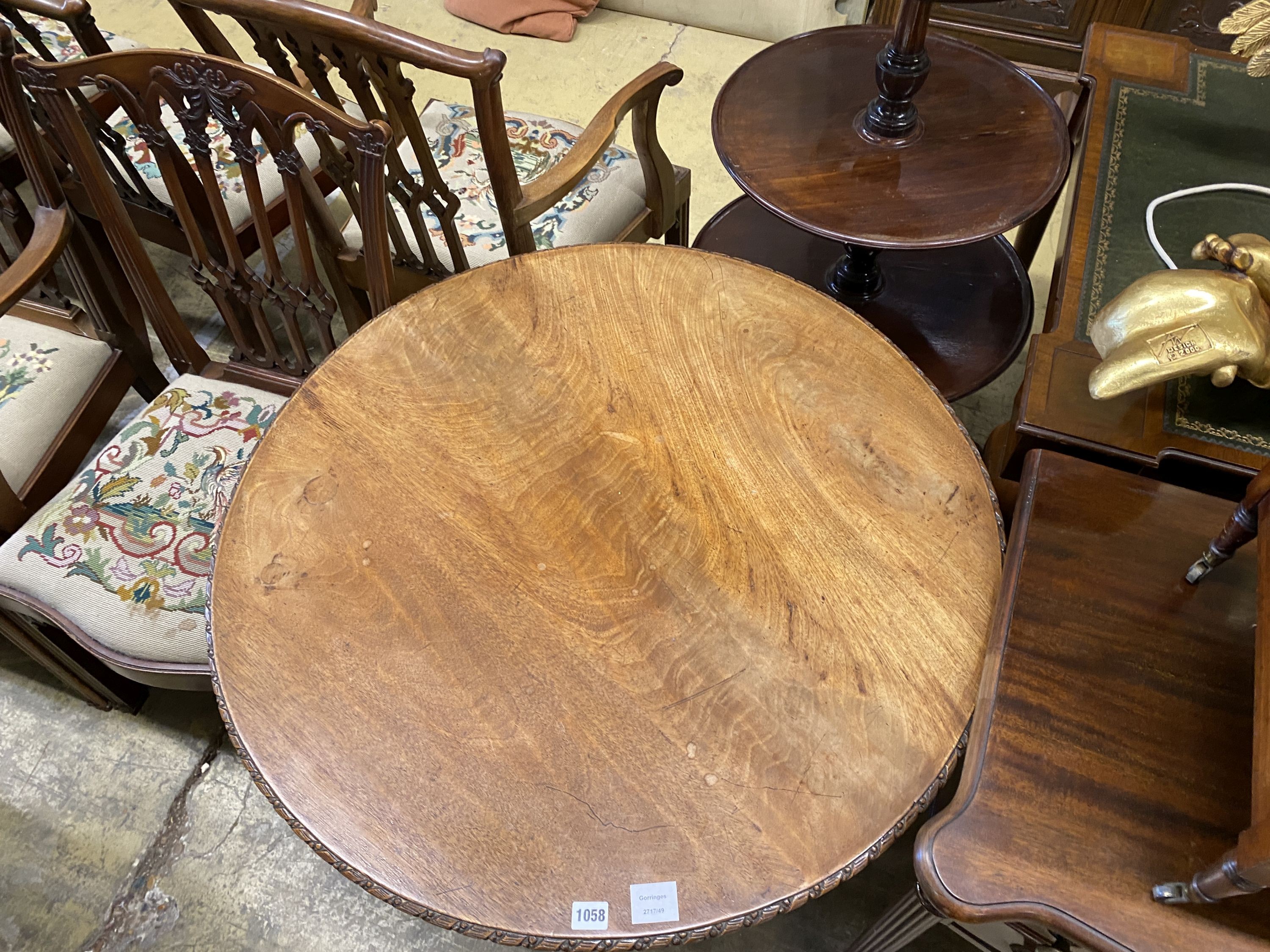 A George III carved circular mahogany tilt top tea table, diameter 88cm, height 71cm